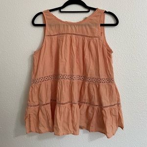 Sleeveless coral blouse
